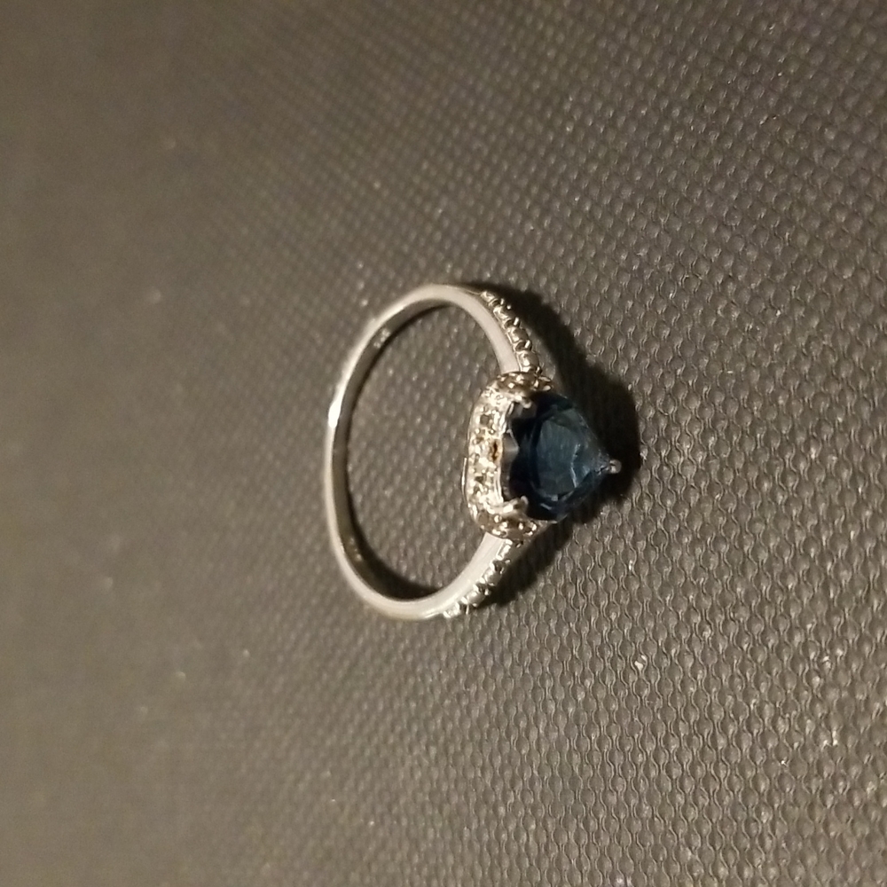 Sterling silver ring with blue heart shaped stone
